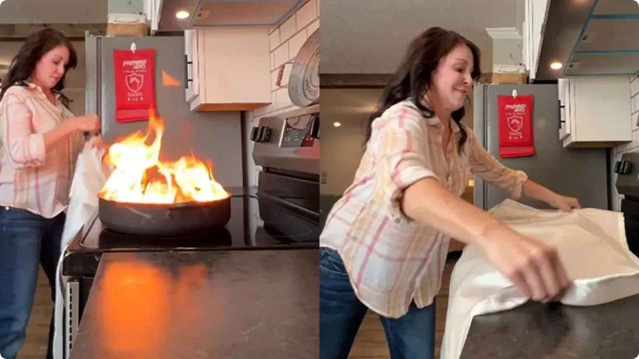 women using prepared hero fire blanket